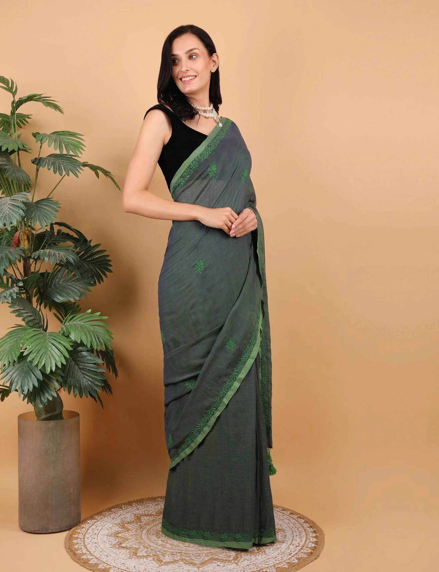 Shwet Women Dark Green Hand Embroidered Chikankari Mulmul Saree