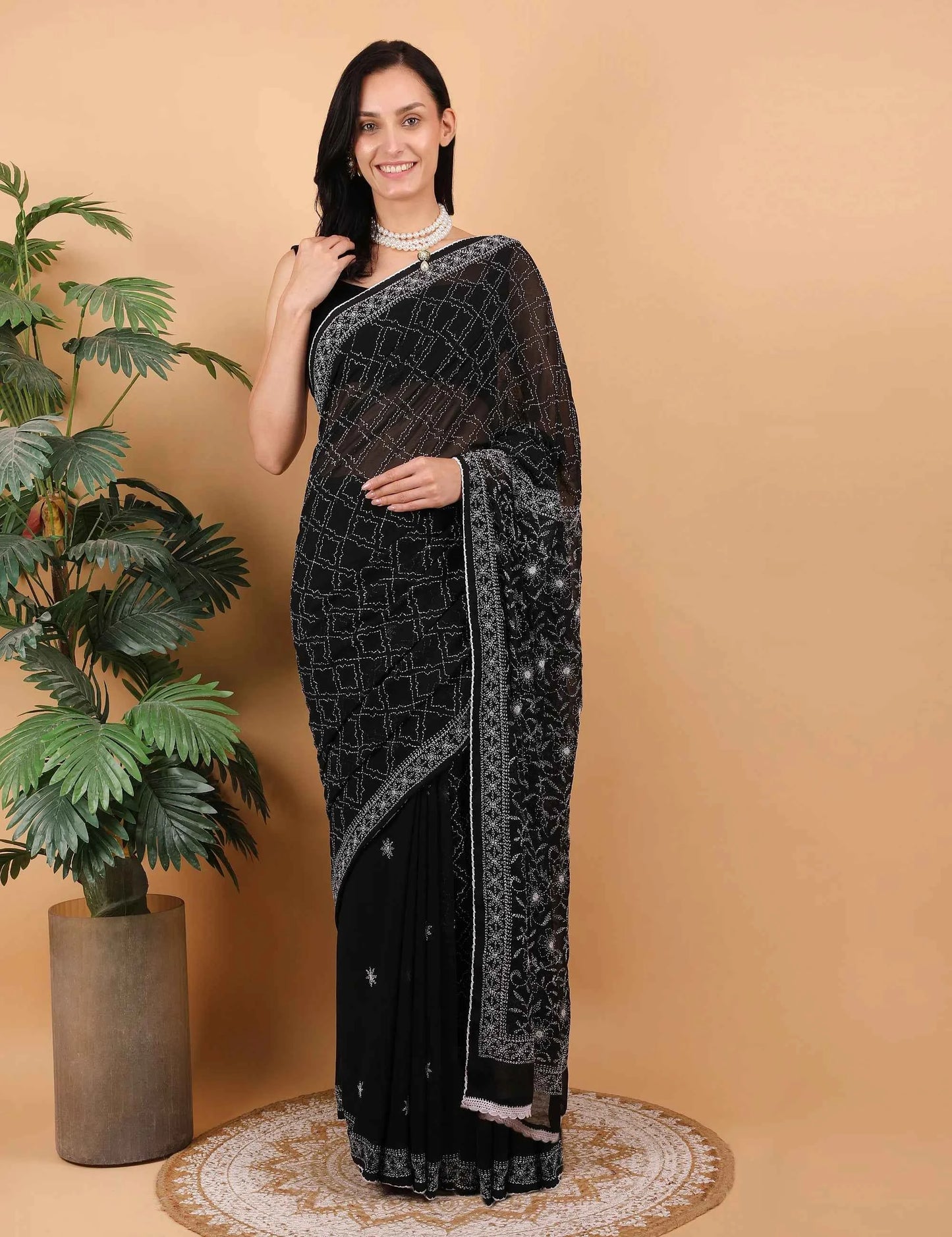 Shwet Women Hand Embroidered Black Georgette Chikankari Saree