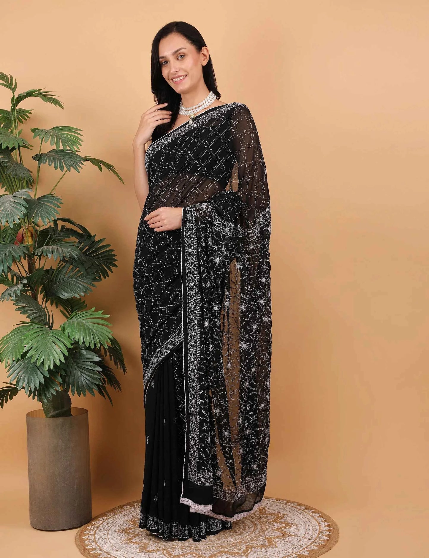 Shwet Women Hand Embroidered Black Georgette Chikankari Saree
