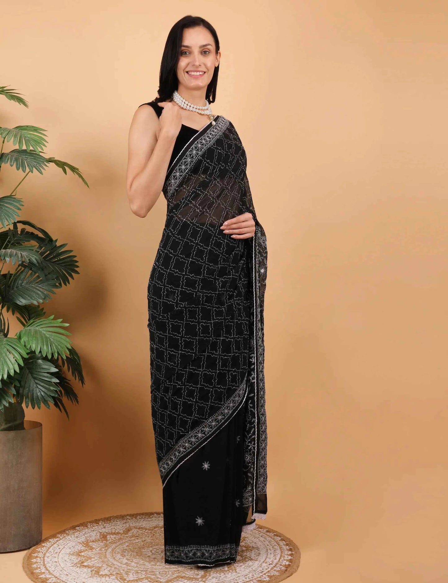 Shwet Women Hand Embroidered Black Georgette Chikankari Saree