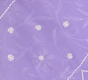 Decorative pattern with white snowflakes and abstract shapes on a purple background