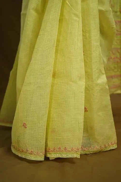 shwet yellow peach kota cotton chikankari saree