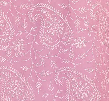 
Close-up of hand-embroidered Chikankari floral motif in white thread on patel hues move  fabric, showcasing intricate tepchi stitches crafted by artisans at Shwet Artistry.
