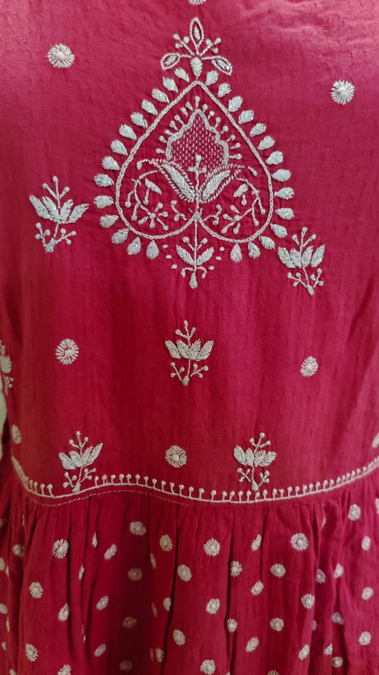 Red dress with white Hand Chikankari embroidery.