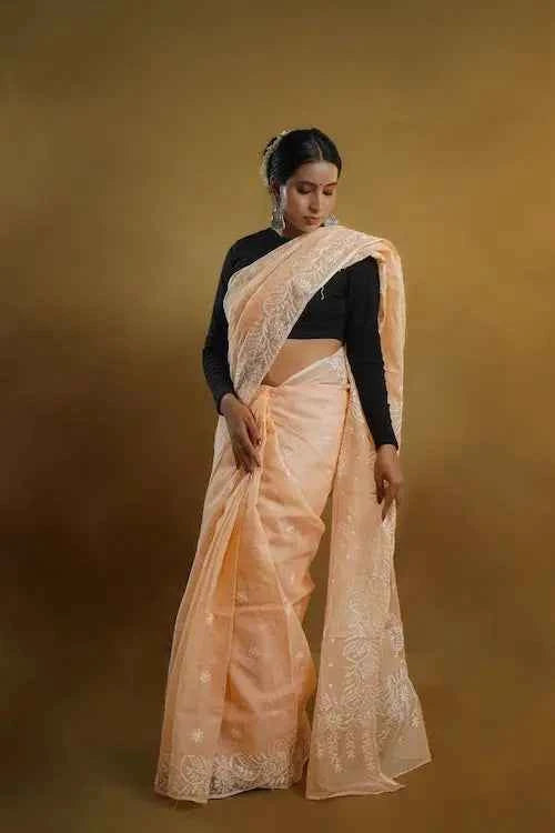 shwet peach kota cotton chikankari saree